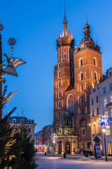 Fototapeta na wymiar Krakow, Poland, St Mary's church and Christmas decorations