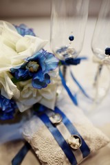 Wedding rings, goblets, flowers and accessories