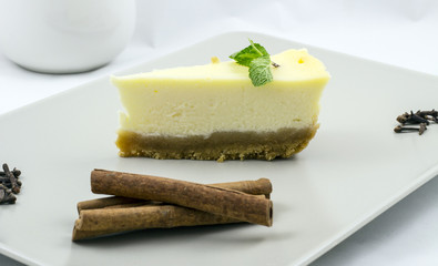 White chocolate cheesecake with mint and cinnamon
