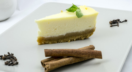 White chocolate cheesecake with mint and cinnamon