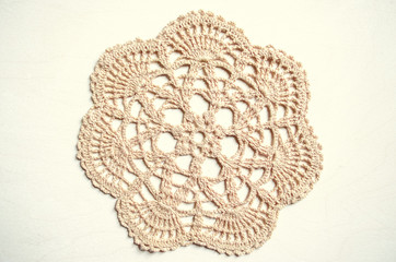 Napkin cream colored, related crochet of coarse  cotton yarn
