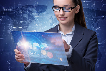 Businesswoman in stock exchange trading concept