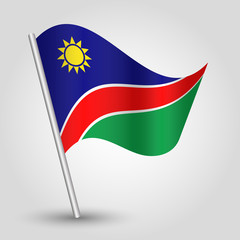 vector waving simple triangle namibian flag on slanted silver pole - icon republic of namibia with metal stick