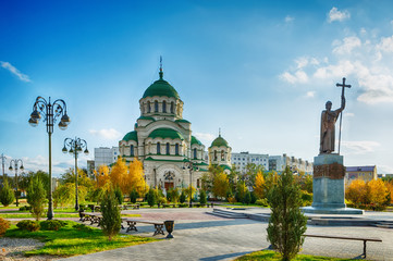 Fototapeta na wymiar Astrakhan. St. Vladimir's Cathedral. The monument to St. Vladimir - Baptist of Russia. Autumn evening.
