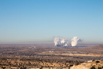 Steam plumes off the San Juan Generating Station, a coal fired power plant in New Mexico - obrazy, fototapety, plakaty