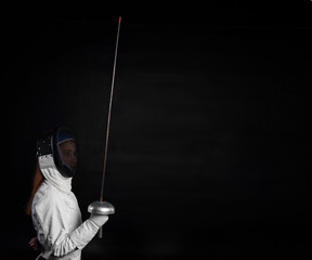 Girl ready for a fencing. Sport concept.