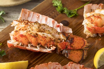 Keuken foto achterwand Seasoned Baked Lobster Tails © Brent Hofacker
