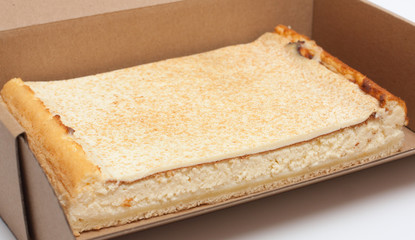 cheese cake in a cardboard box