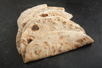 Indian Chapatis on a Dark Background