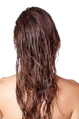 Portrait of a beautiful model with wet hair and clean skin and freckles after shower isolated on white background.
