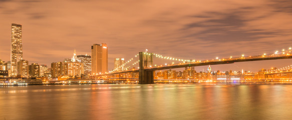 Fototapeta na wymiar Night view of Manhattan and Brooklyn bridge