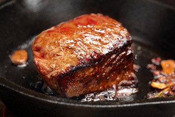 Beef steak on cast iron skillet
