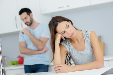 couple having an argument in the kitchen