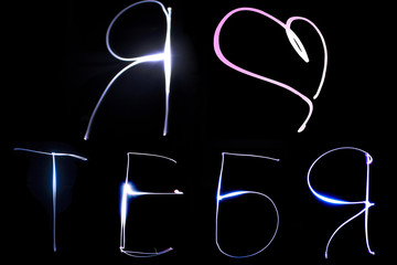 I love you in Russian on the black background glowing