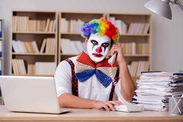 Clown businessman working in the office