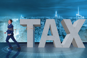 Businessman suffering from high taxes