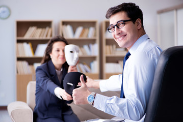 Woman with mask during psychologist visit