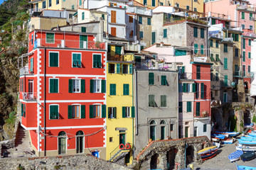 Fototapeta na wymiar Colorful architecture of Riomaggiore in Cinque Terre national park, Liguria, Italy