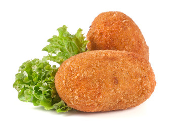 two fried breaded cutlet with lettuce isolated on white background