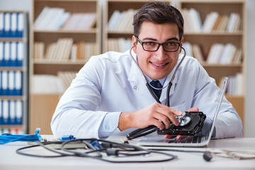 Proffesional repairman repairing broken hard drive