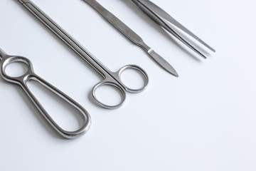 instruments for plastic surgery on white background