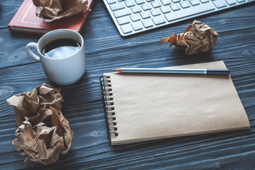 concept of writer desktop wooden background top view mock up