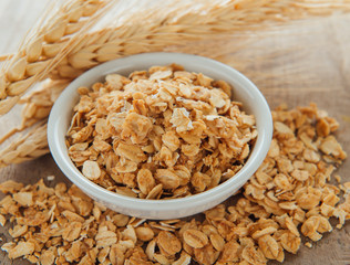 muesli with a bowl on table