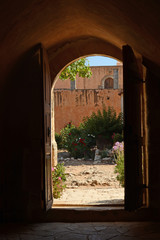 The door leading into the monastery Arkadi courtyard. Crete, Greece
