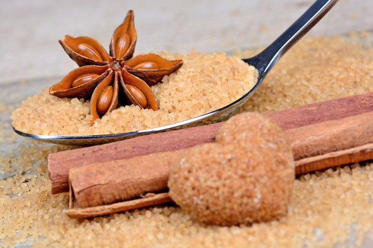 Silver spoon with sugar and anason star