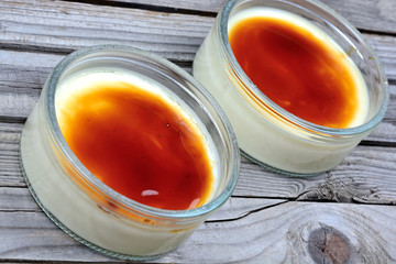 Bowls with creme brulee on table