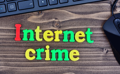 Internet crime words on table