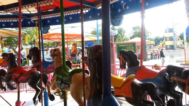 Empty Carousel With Horses