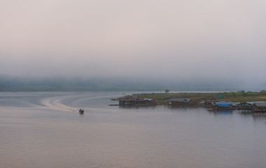 Sangkhlaburi village antique bridge landmark traditional culture in dam lake, kanchanaburi, Thailand