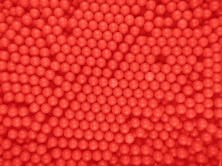Dragee balls background - red