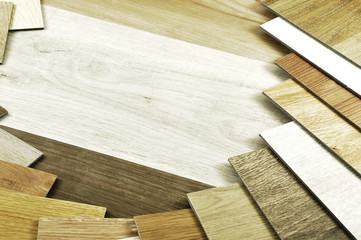 Laminate Wood Concept - Sample wood.Wood color guide, samples of wood choice on wooden b