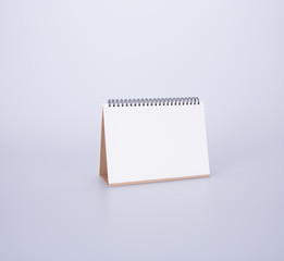 diary or open leather notebook on the background.