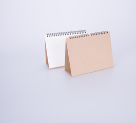 diary or open leather notebook on the background.