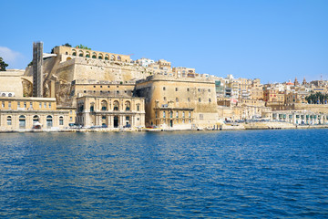 View of Valletta capital city fortifications from the water of G