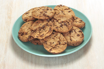 Chocolate chips cookies on plate with copyspace