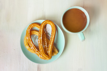Churros with hot chocolate, traditional Spanish breakfast
