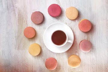 Obraz na płótnie Canvas Coffee with macarons and copyspace, overhead shot