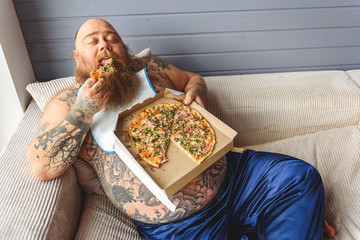 Man eating pizza