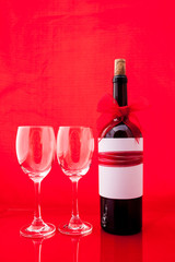 St Valentine's setting with present and red wine
