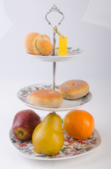 tray or three tier serving tray with dessert on background.