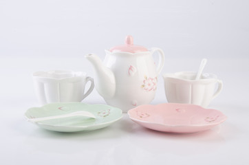 Obraz na płótnie Canvas tea set or porcelain tea set on background.
