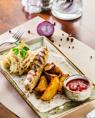 kebab with potatoes and salad