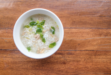 Boiled rice on a wood table.