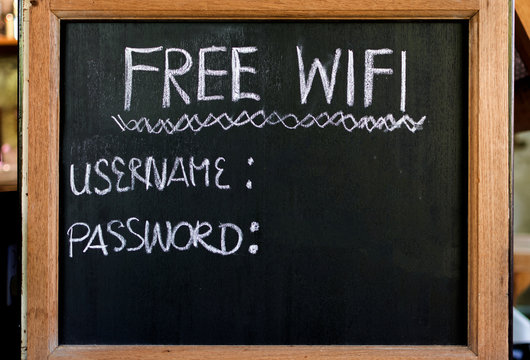 Free wifi sign. Wooden frame.