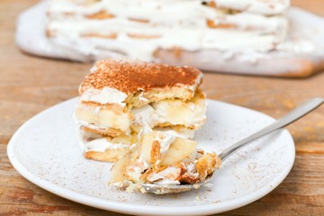 a slice of cake with a banana