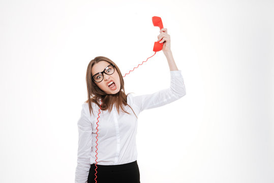 Crazy business woman tangled with phone tube wire